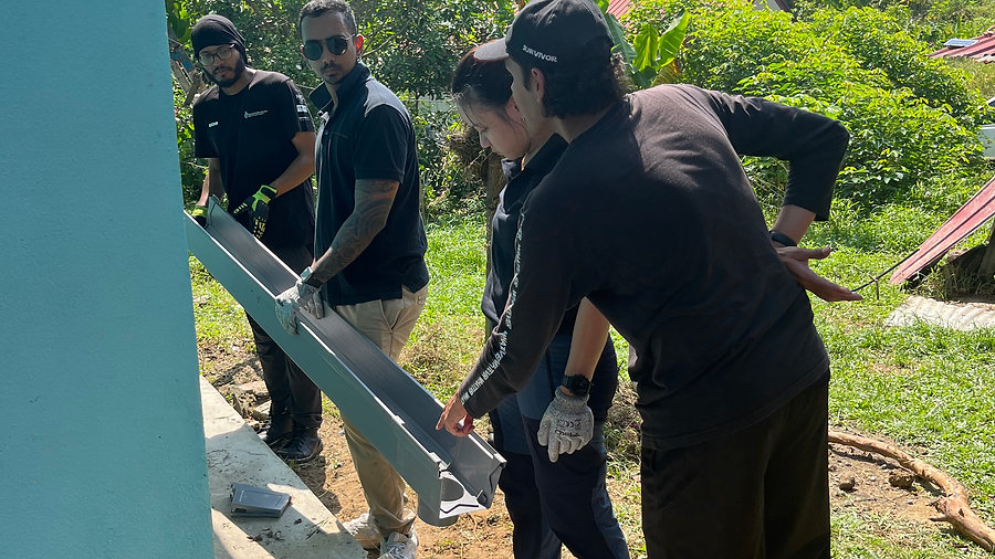Bringing smiles through Rainwater Collection Systems & Sepak Takraw in Kampung Gurney!