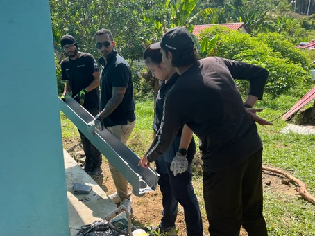 Bringing smiles through Rainwater Collection Systems & Sepak Takraw in Kampung Gurney!